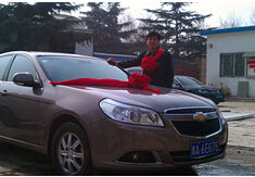 超前涂料獎勵員工轎車，真石漆生產(chǎn)廠家！